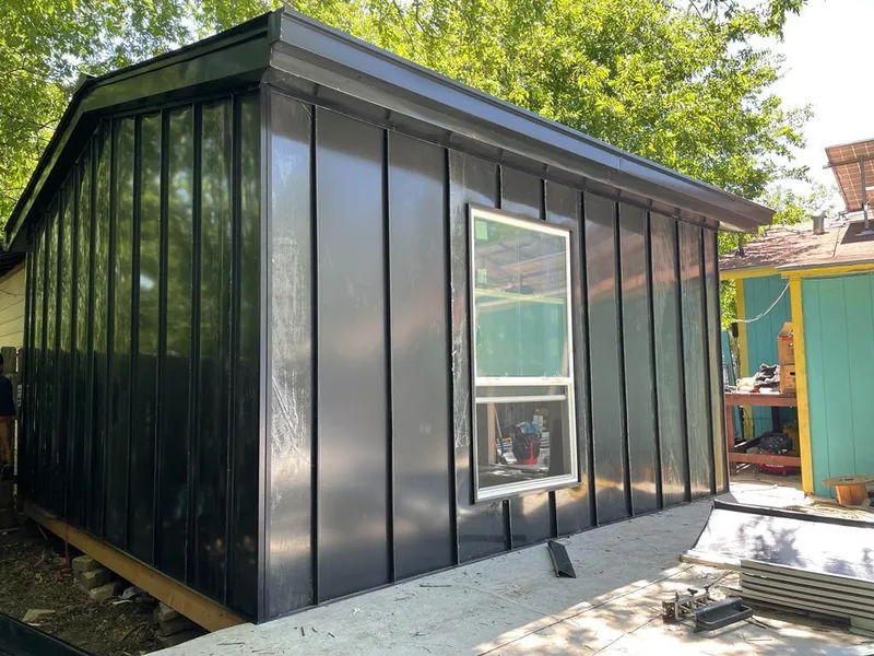 Black standing seam metal wall panels for Metal Roof Installation in Ione