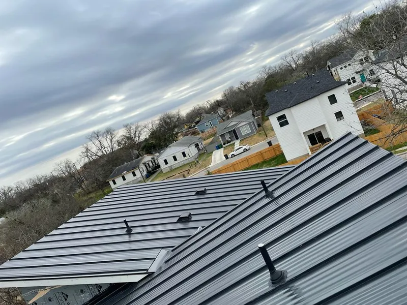 Standing seam metal roof panels with vents for Skylight Repair in Ione